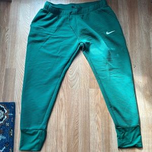 Green nike pants, XL womens